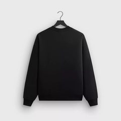Kith collaborates with Nanzuka to create a trendy, loose, casual men's and women's heavyweight looped round neck hoodie with box logo