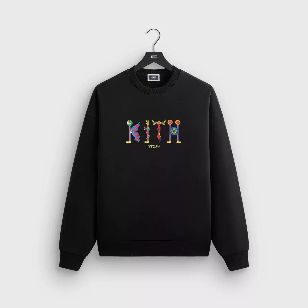 Kith collaborates with Nanzuka to create a trendy, loose, casual men's and women's heavyweight looped round neck hoodie with box logo